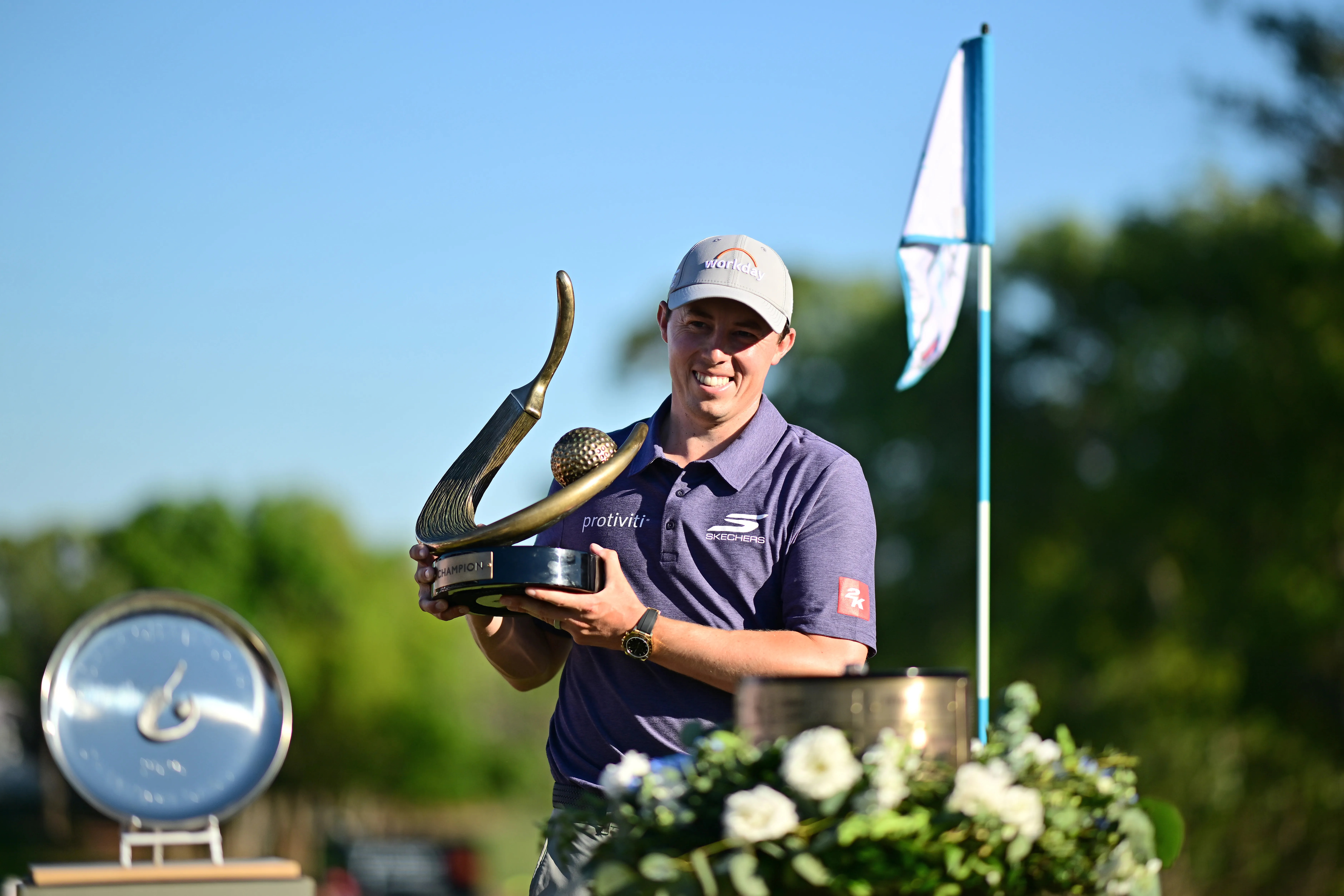 Valspar Champion Matt Fitzpatrick holding trophy made by Malcolm DeMille